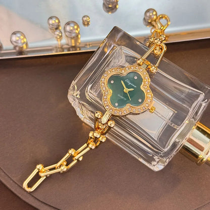 Four-Leaf Clover Gold Chain Watch for Women – Elegant Jewelry Watch