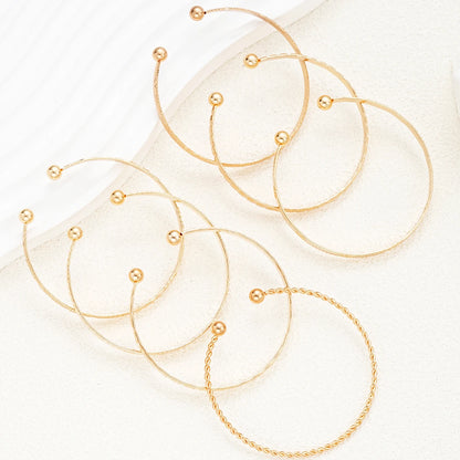 Noverlla™ 7-Piece Gold Heart Bracelet Set – Trendy Fashion Bangles for Women