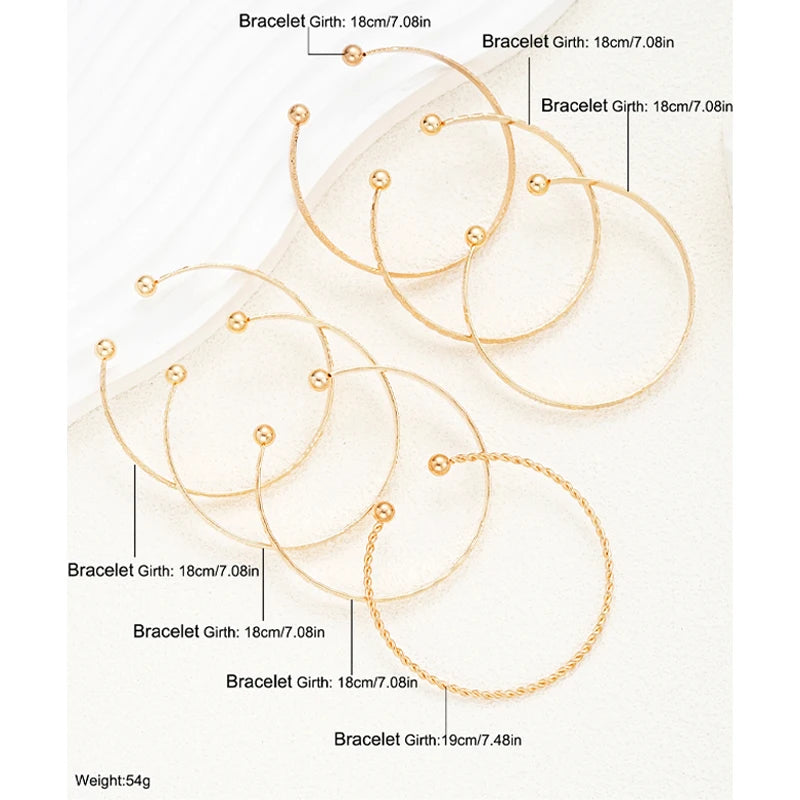 Noverlla™ 7-Piece Gold Heart Bracelet Set – Trendy Fashion Bangles for Women